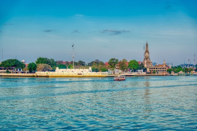 Wichai Prasit Fort and Wat Arun in the morning by the Chao Phraya River in Bangkok, Thailand