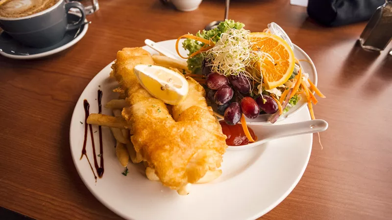 tuck-into-a-true-kiwiana-fish-n-chips-dinner-seafood-chowder-or-nz-lamb-salad-overlooking-the-bay-of-islands-paihia-new-zealand-1